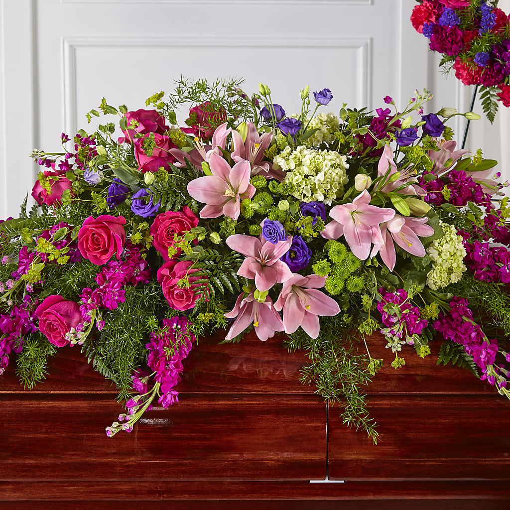 Radiant Tribute Casket Spray – MELODY'S FLOWERS, Burlington WA